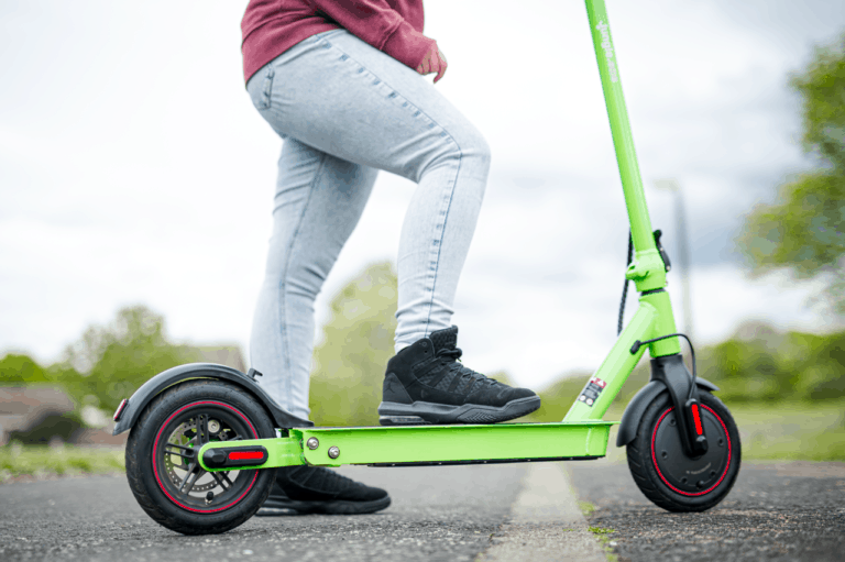 green electric scooter jungle one kickstand low side shot
