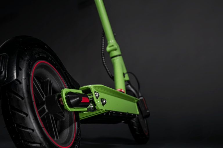 close up of green electric scooter side, rear angle
